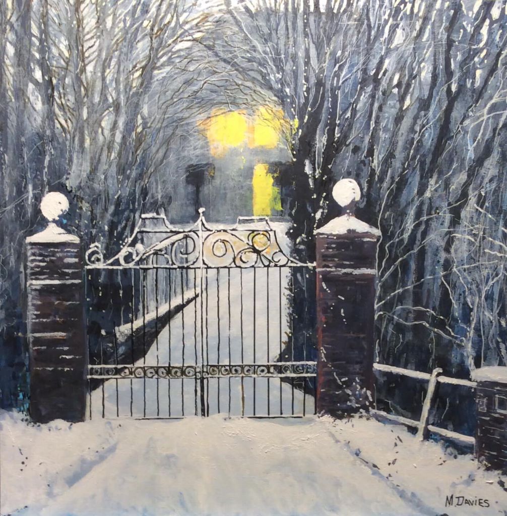snowy night scene gate leading to house